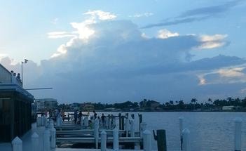 Naples marina waterfront at golden hour